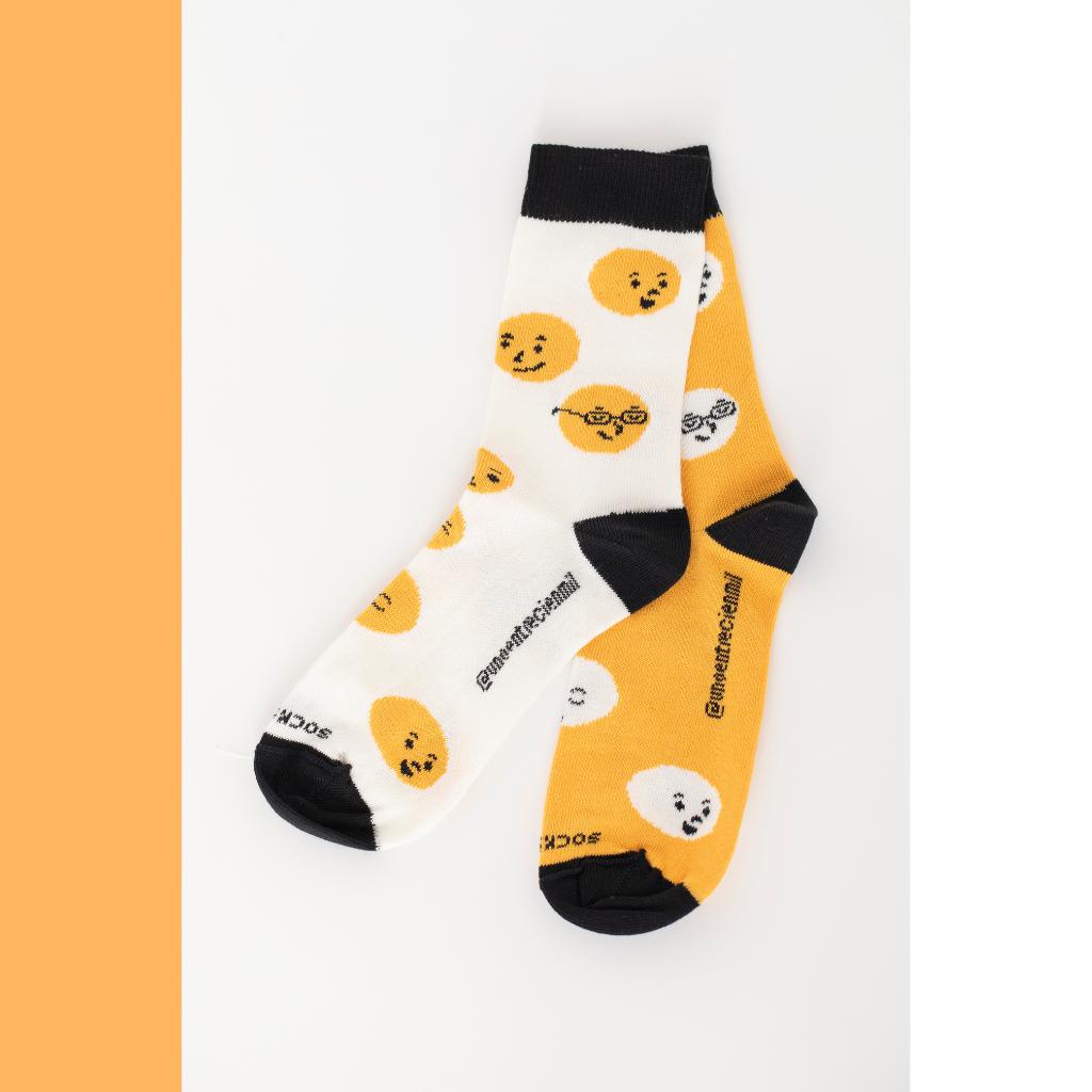Calcetines infantiles desparejados blanco-naranja