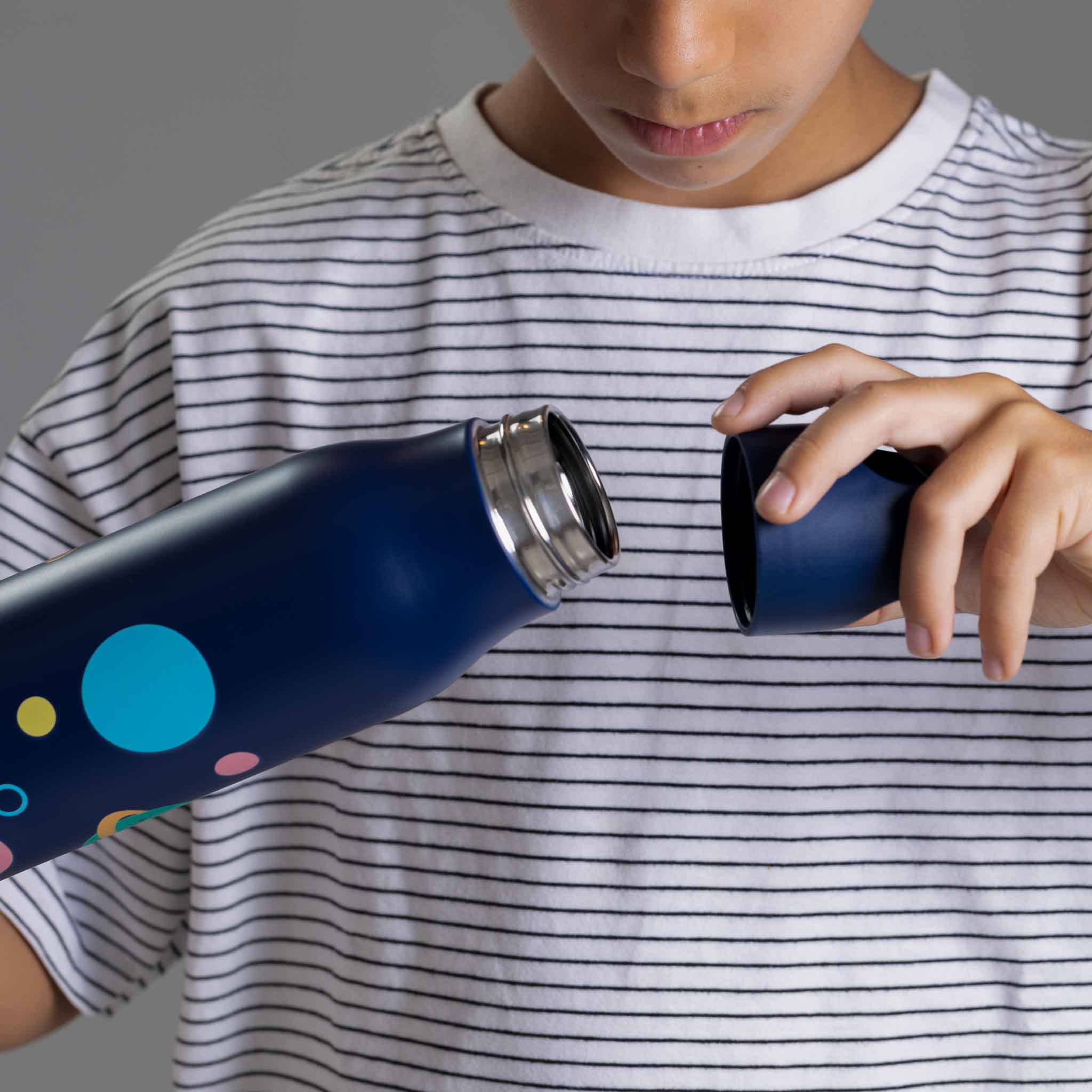 Botella solidaria planetas de Unoentrecienmil