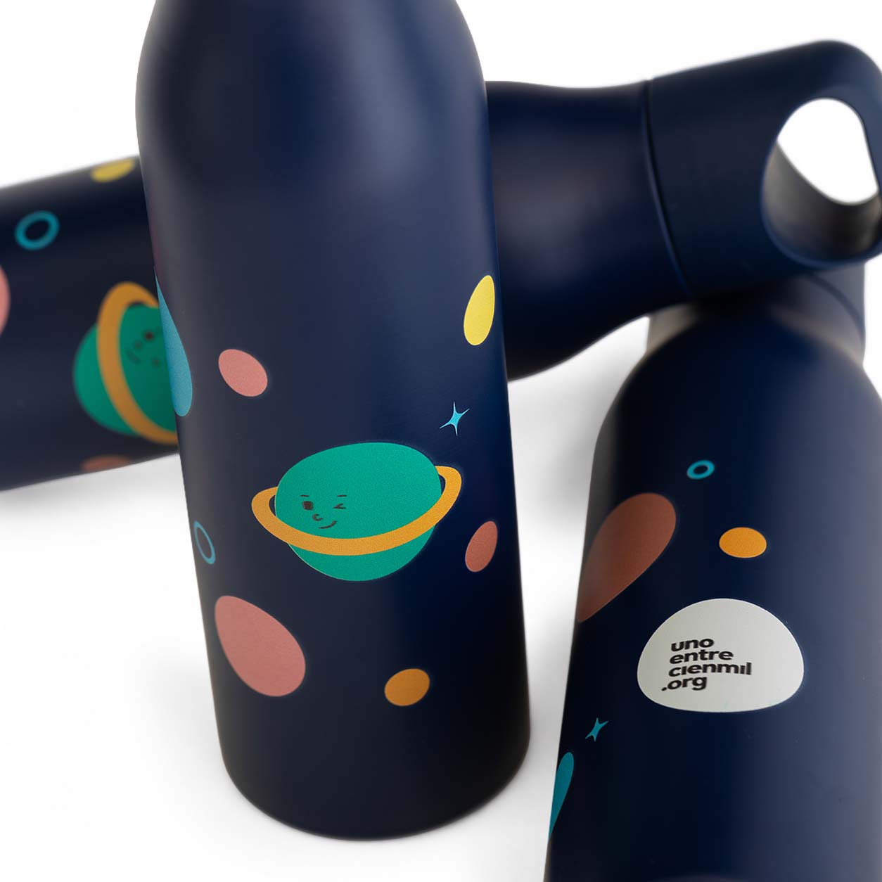 Botella solidaria planetas de Unoentrecienmil